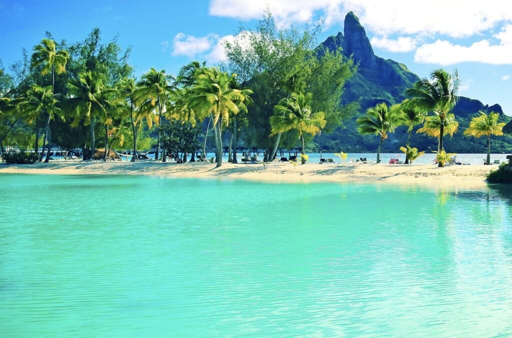 Bora Bora lagoon and Mount Otemanu view during sunny luxury travel season
