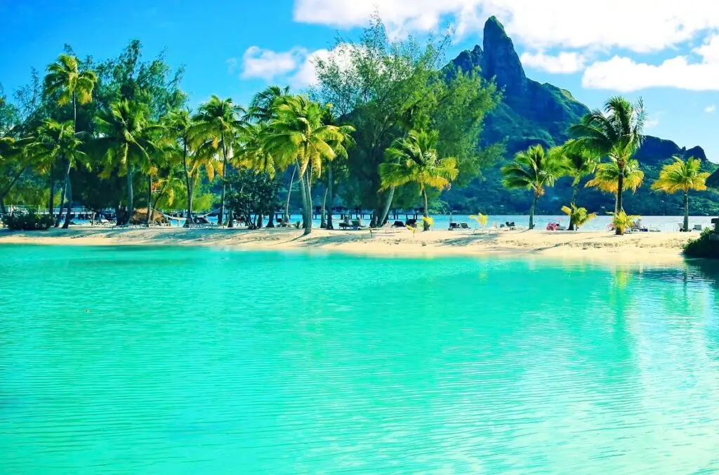 Bora Bora lagoon and Mount Otemanu view during sunny luxury travel season