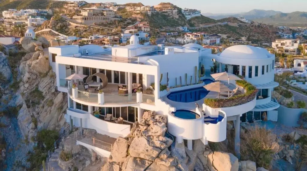 Ocean view luxury villa exterior in Cabo San Lucas with multi-bedroom layout and terrace